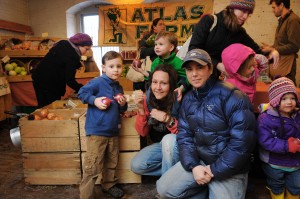 Kristin Barry, Shelly Risinger, and their children Brycen and Cobyn at the Northampton Winter Farmers’ Market. Jason Threlfall photo.
